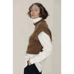 iris vest in saddle