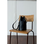 tall collar bucket bag in black