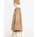 etta cape in tan sheepskin