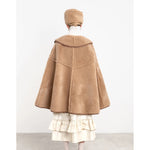 etta cape in tan sheepskin