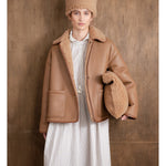 shearling clutch bag in tan
