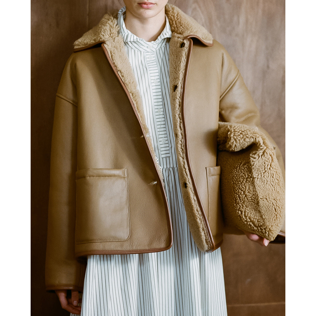 shearling clutch bag in tan