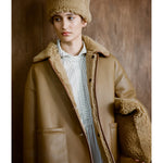 shearling clutch bag in tan
