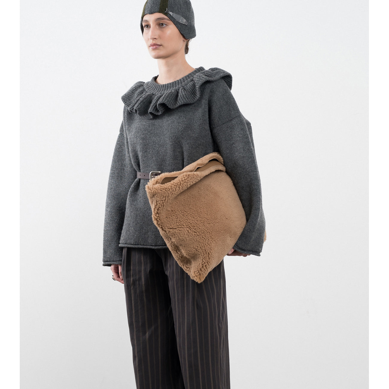 shearling clutch bag in tan