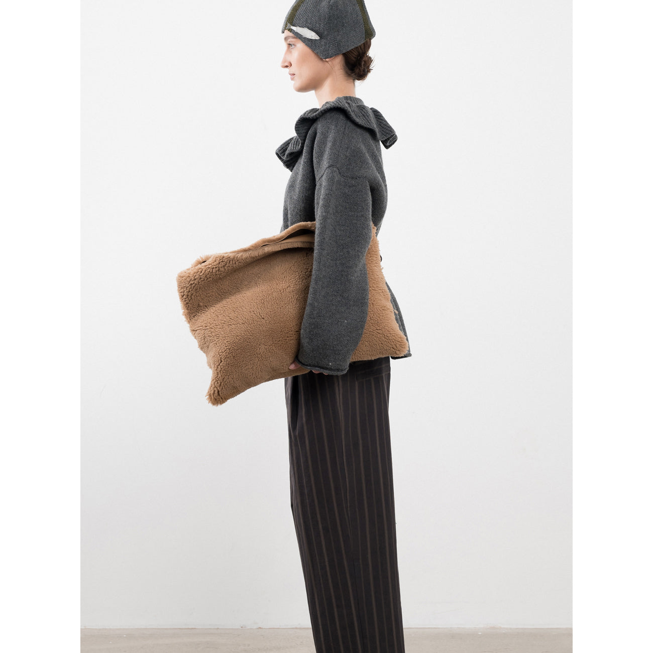 shearling clutch bag in tan