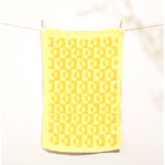 sunrise linen tea towel in lemon