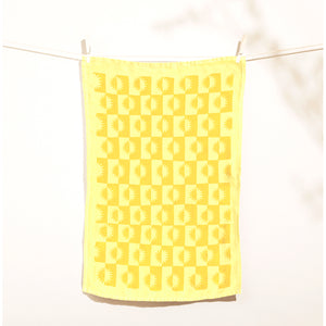 sunrise linen tea towel in lemon