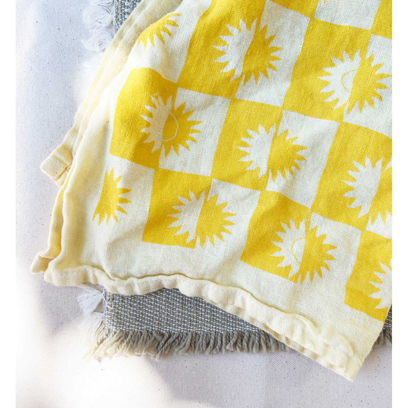 sunrise linen tea towel in lemon