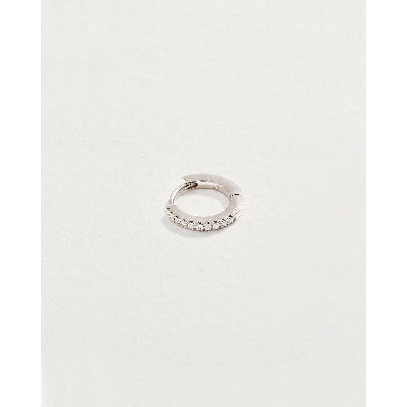 tiny pavé huggie in white gold
