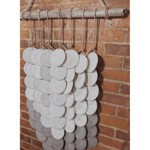 white + grey layered disc wall hanging