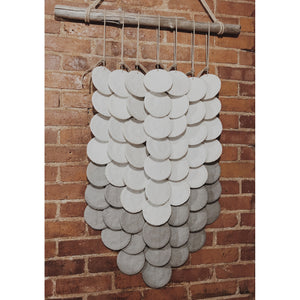white + grey layered disc wall hanging