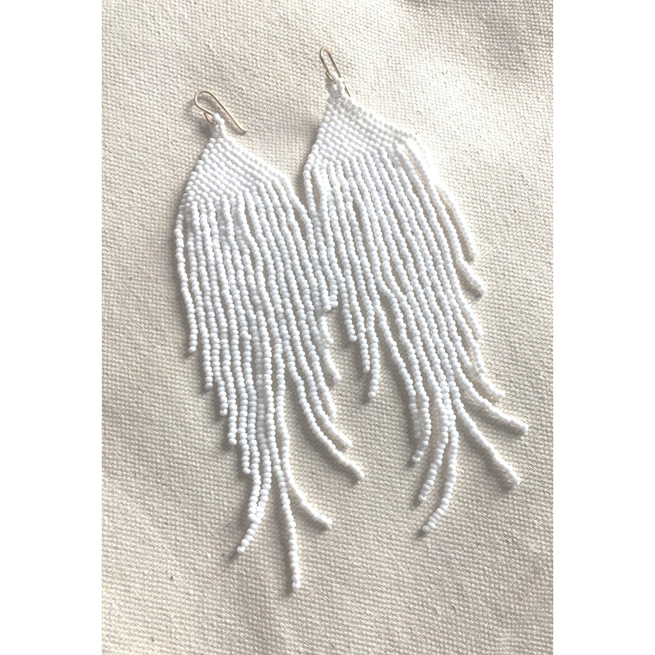 white earrings